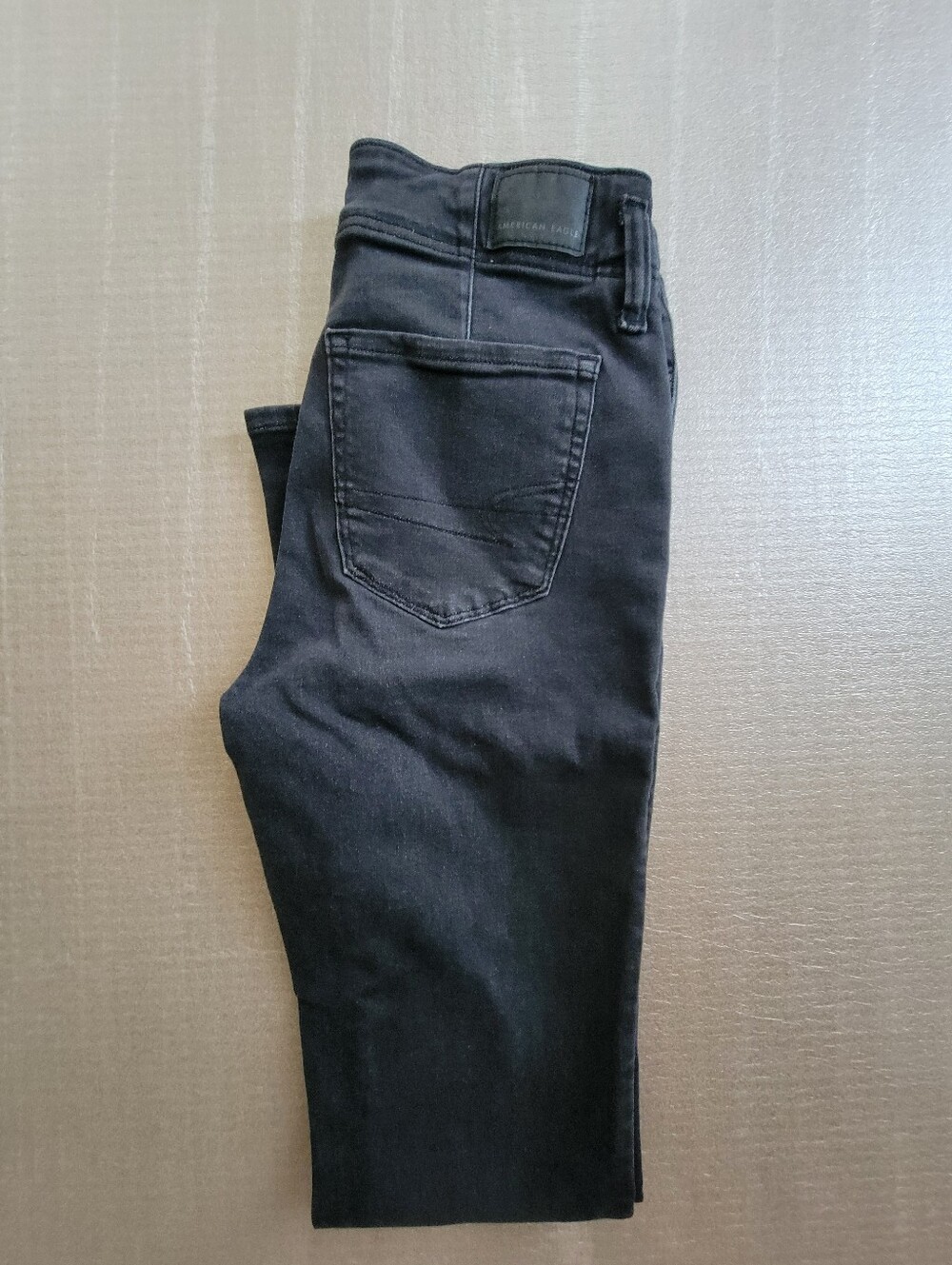 AE Women's Next Level High Waisted Skinny Kick Jean Size 2 Short Black Blaze